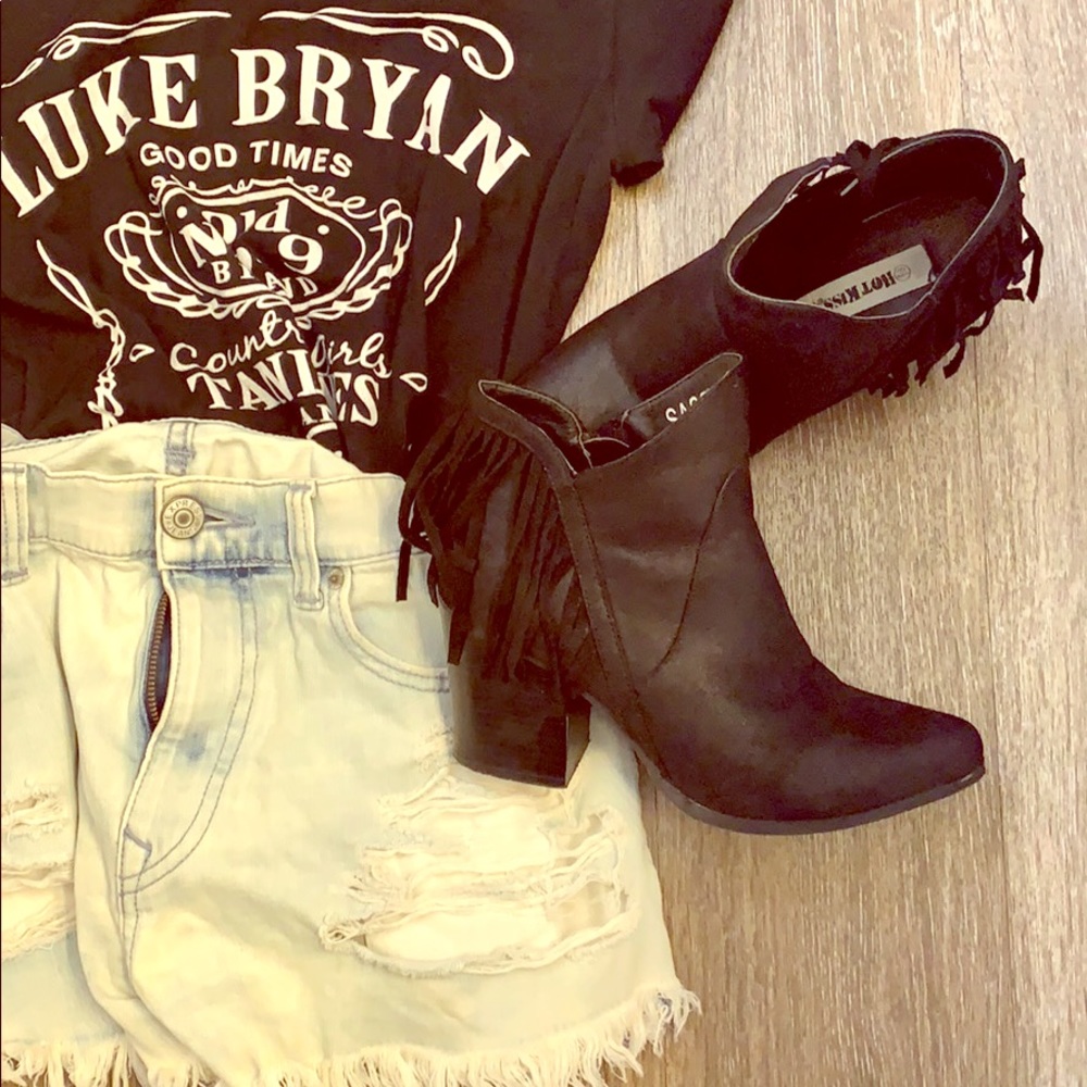 Black fringe boots.